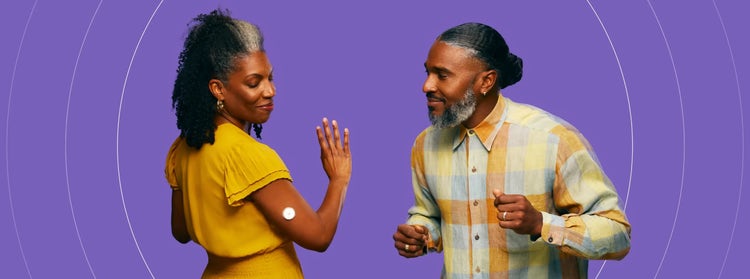 Photo of an African-American man and woman, both high-risk individuals, dancing.