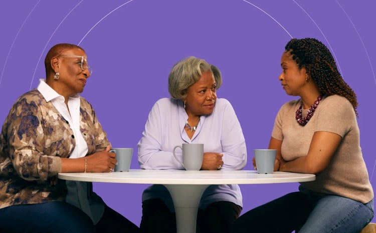 Three older African-American women with COVID-19 high-risk factors drinking coffee and talking against a purple background.